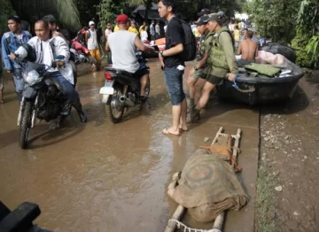 Tifón e inundación enlutan a Filipina Tifón e inundación enlutan a Filipina