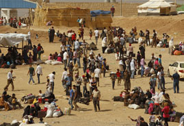 Crisis en Siria: denuncian ataque químico y estiman 2 millones de refugiados Crisis en Siria: denuncian ataque químico y estiman 2 millones de refugiados