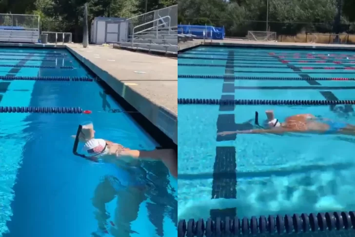 Nadó en una pileta con un vaso de leche sobre la cabeza