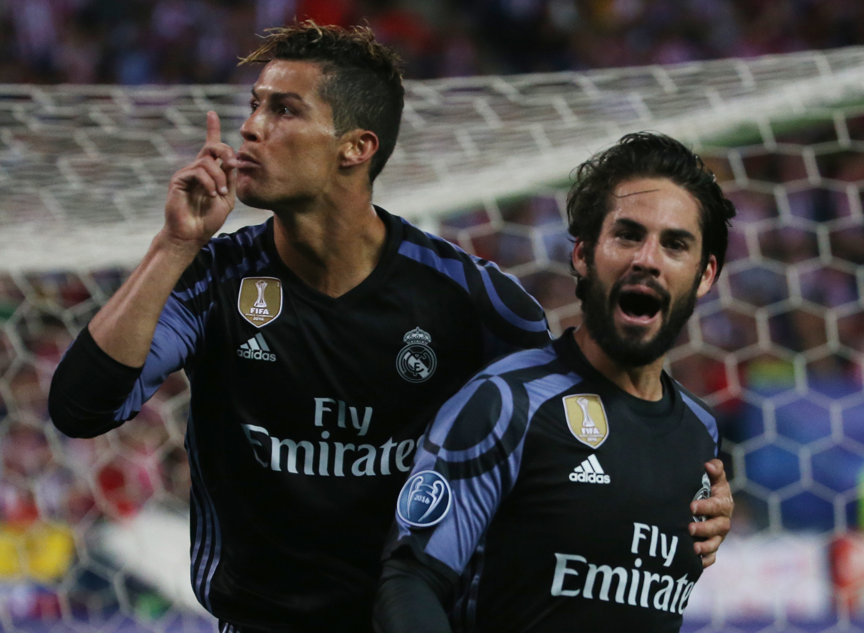 Real Madrid's Isco celebrates scoring their first goal with Cristiano Ronaldo - 17-CCT51731 Real Madrid's Isco celebrates scoring their first goal with Cristiano Ronaldo - 17-CCT51731