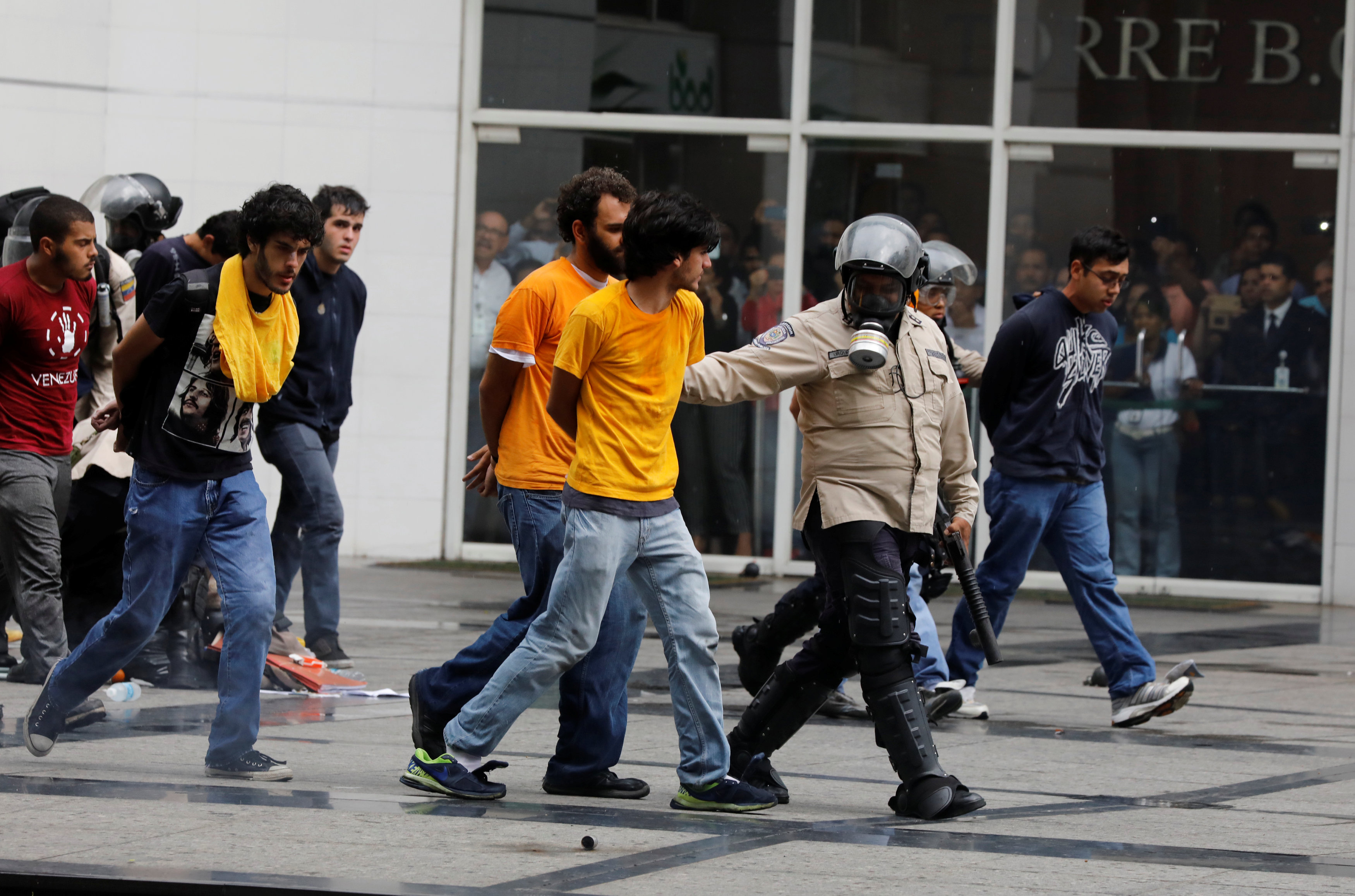 Police detain protesters during a rally against Venezuela's President Nicolas Maduro's government in Caracas Police detain protesters during a rally against Venezuela's President Nicolas Maduro's government in Caracas