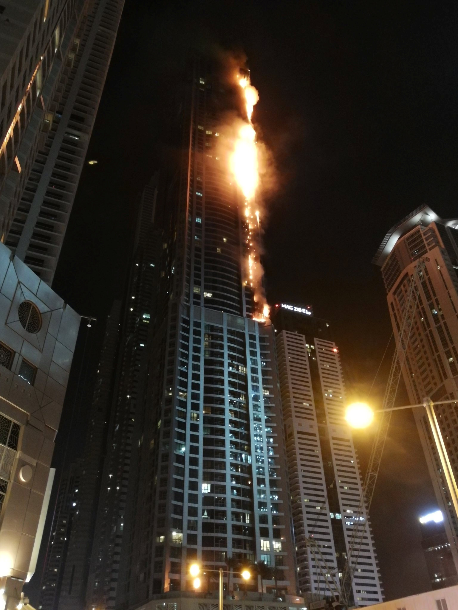 Flames shoot up the sides of the Torch tower residential building in the Marina district, Dubai, United Arab Emirates in this picture by Mitch Williams - 3TP NARCH/NARCH30 MNDTY