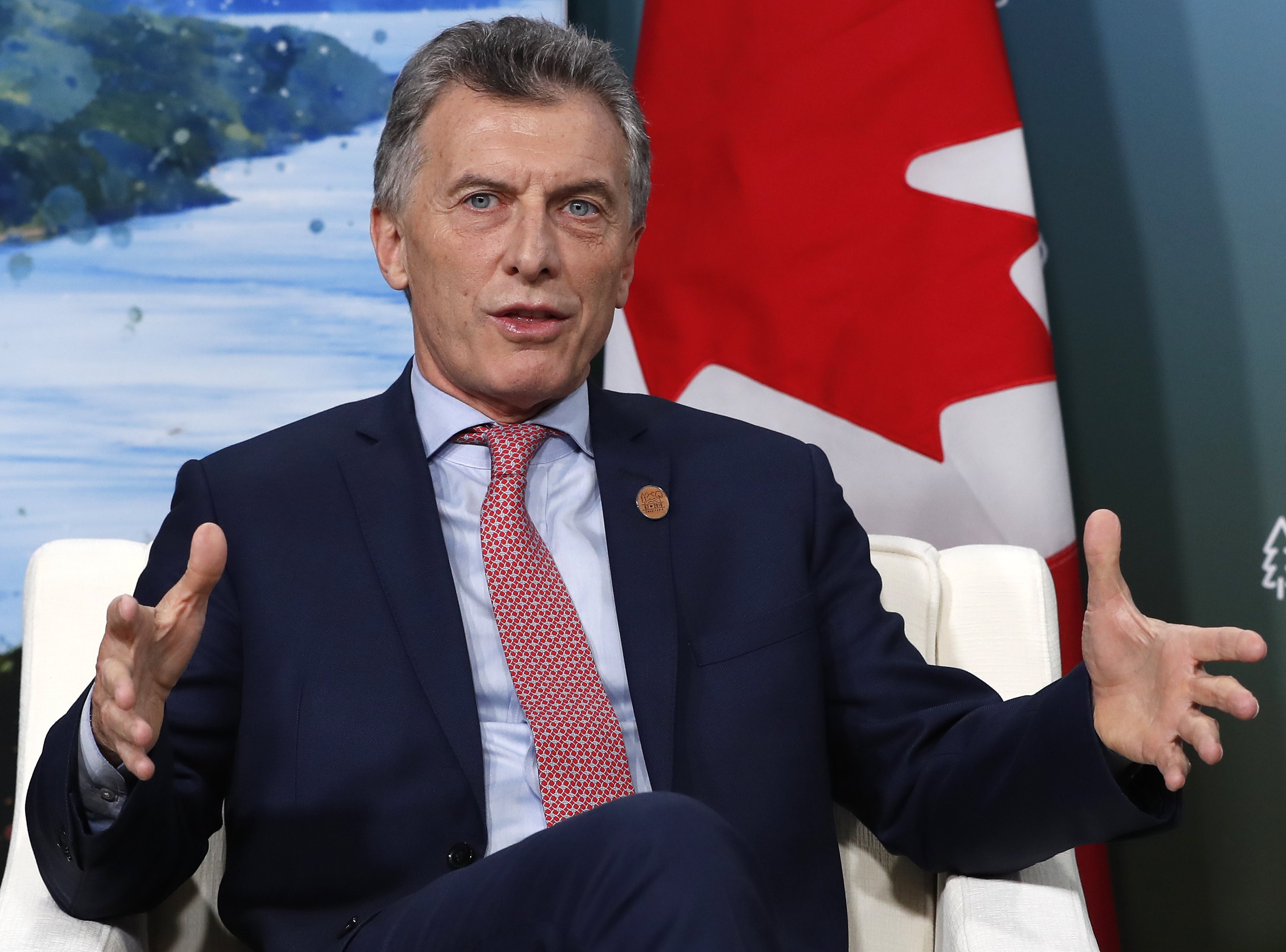 Argentina's President Mauricio Macri speaks during a meeting with Canada's Prime Minister Justin Trudeau at a G7 Summit in the Charlevoix town of La Malbaie